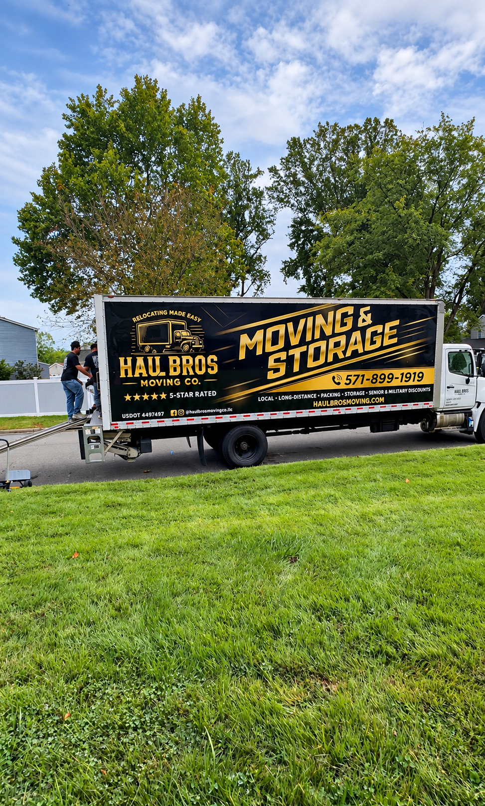 Haul Bros moving truck parked on a suburban residential street