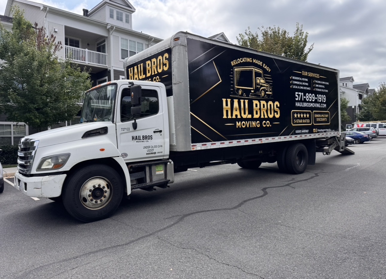 Haul Bros Moving truck outside a Woodbridge apartment community